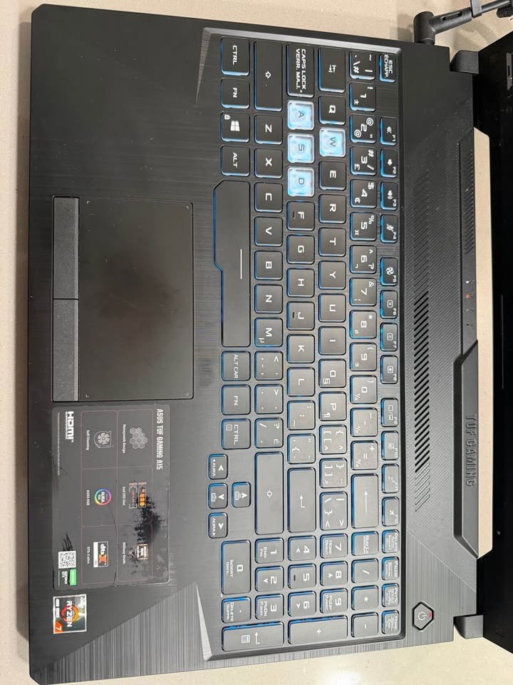 Close-up of ASUS TUF A15 RGB keyboard with backlit keys and gaming key layout