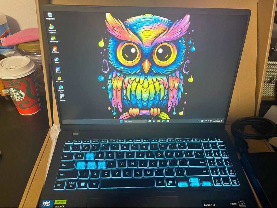 ASUS Gaming V16 Core 5 210H RTX 4050 laptop with RGB keyboard and 15-inch display