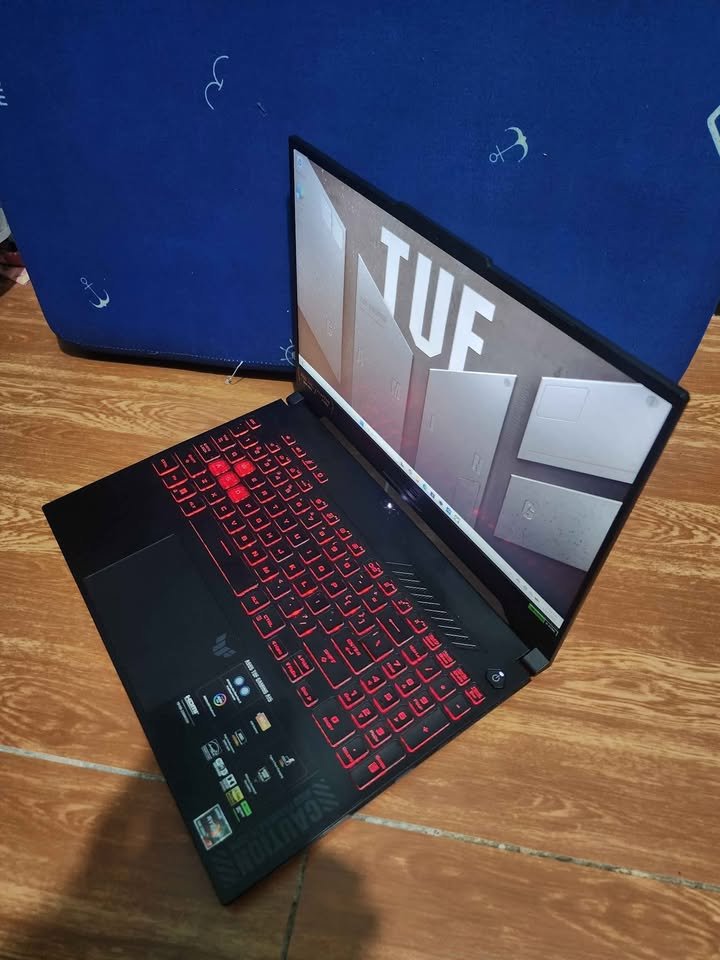 ASUS TUF Gaming A15 Ryzen 7 7435HS gaming laptop side view with RGB keyboard