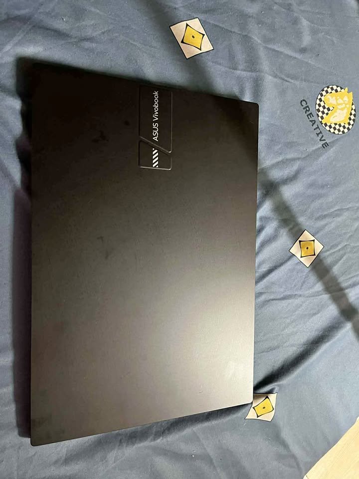 Closed ASUS Vivobook 15 Core i7 laptop showing sleek matte finish and branding