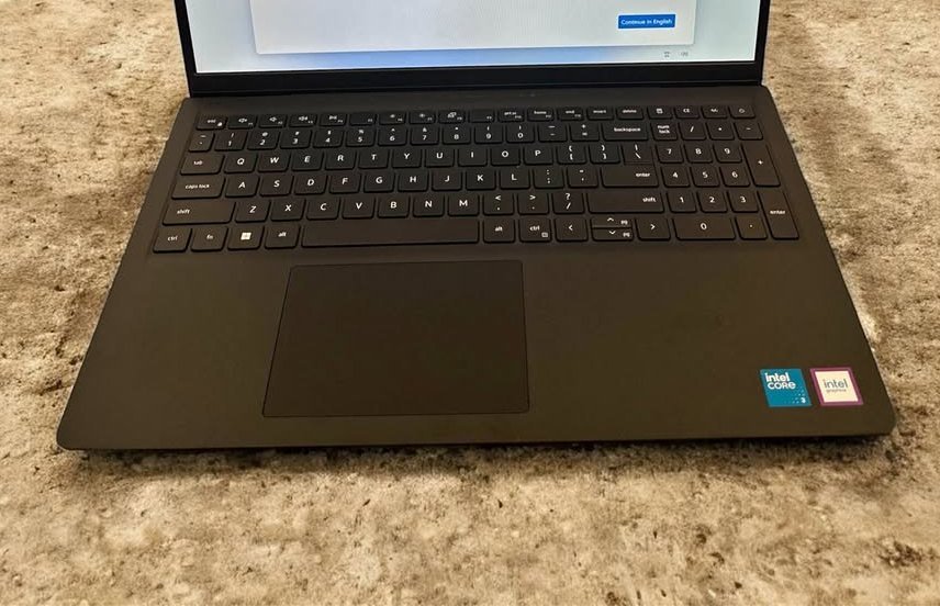 Dell 15 Intel Core 3 100U laptop keyboard and trackpad layout with Intel branding