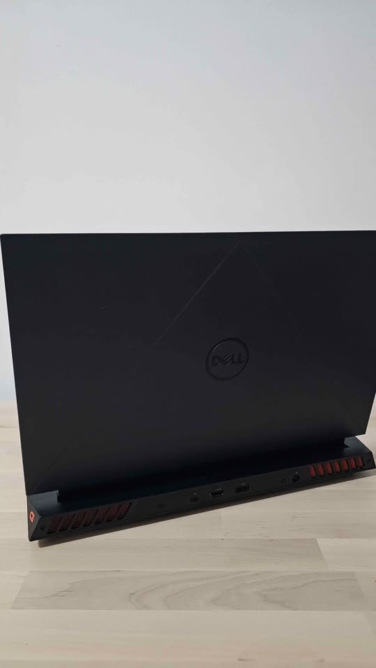 Dell G15-5530 gaming laptop rear view showing lid design and cooling vents with Intel Core i5-13450HX and RTX 3050