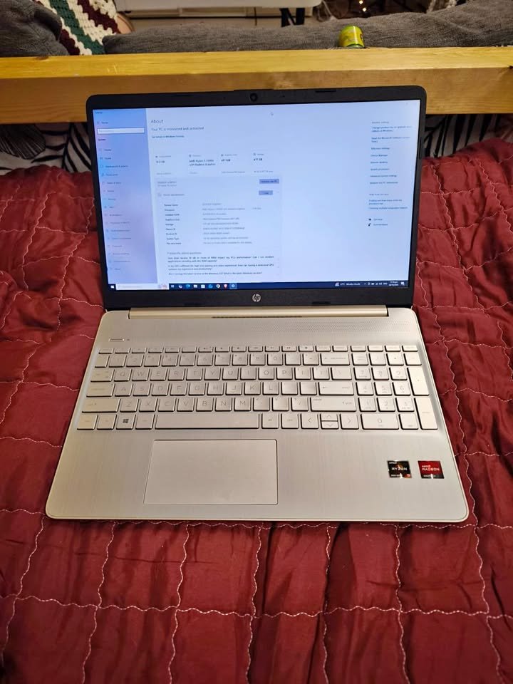 HP 15 Ryzen 7 5825U laptop showing Windows system settings