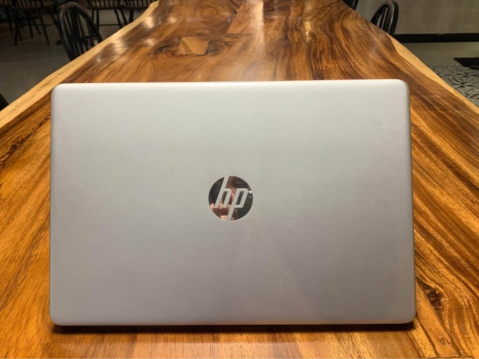 Silver back panel of HP 15 AMD Ryzen 7 5825U laptop showcasing minimalistic design and durable chassis