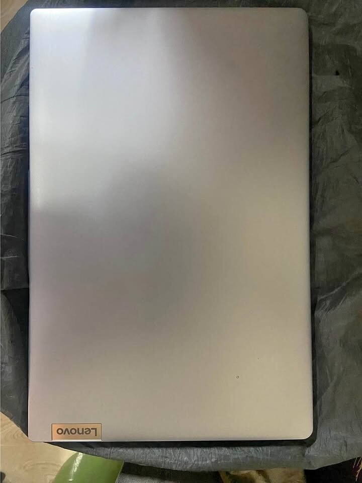 Lenovo IdeaPad Slim 3 with a metal-finished top panel