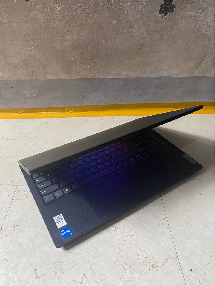 Side angle view of Lenovo V15 G4 Core i5 laptop showing slim design and keyboard