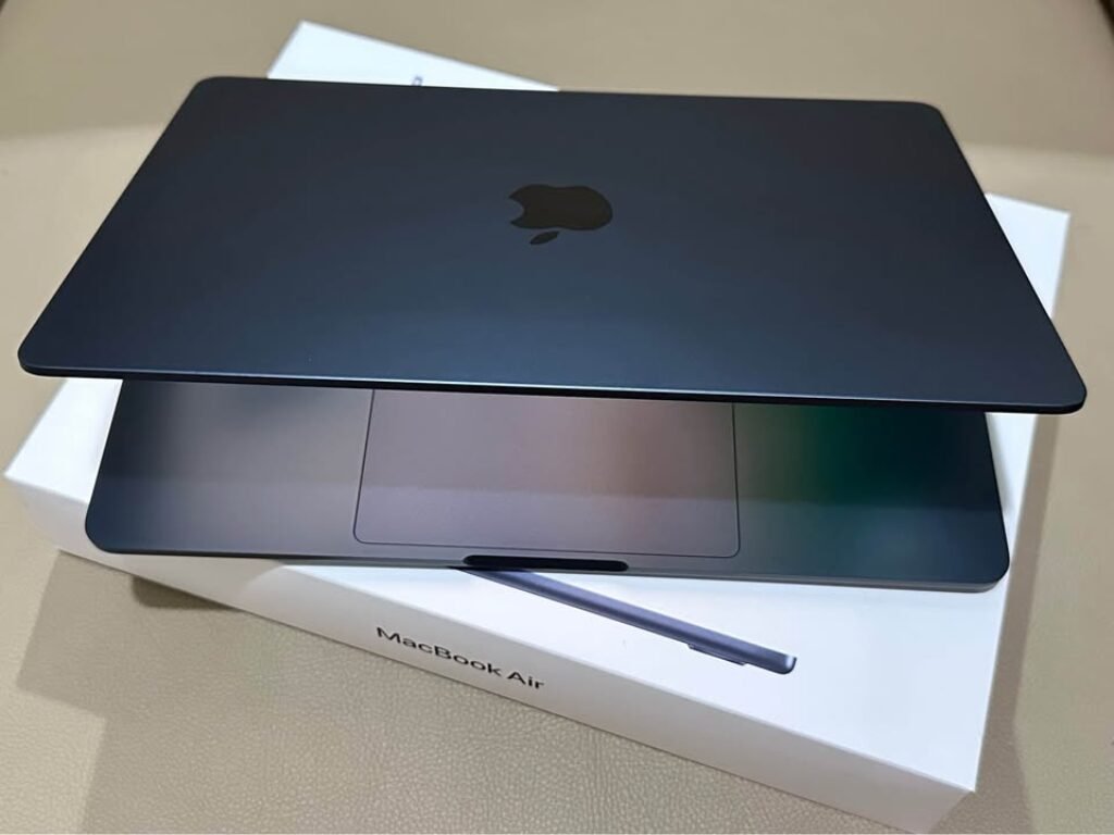 Midnight Apple MacBook Air 13-inch (M4) showing sleek aluminum unibody design and matte finish on the lid