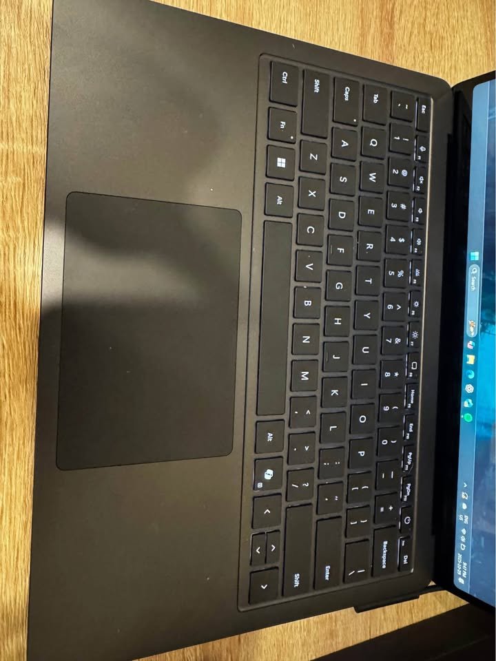 Microsoft Surface Laptop Snapdragon X Plus keyboard layout with backlit keys