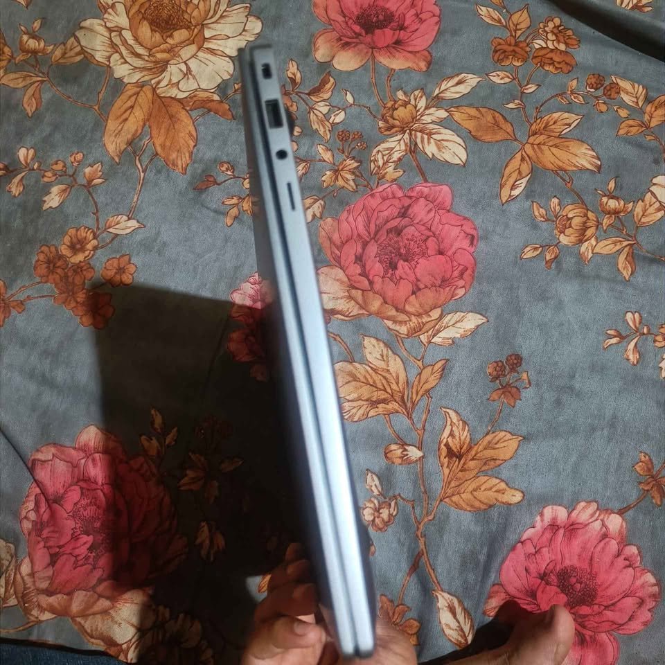 Samsung Galaxy Book4 laptop side profile highlighting the 3.5mm audio jack and built‑in ports on the chassis