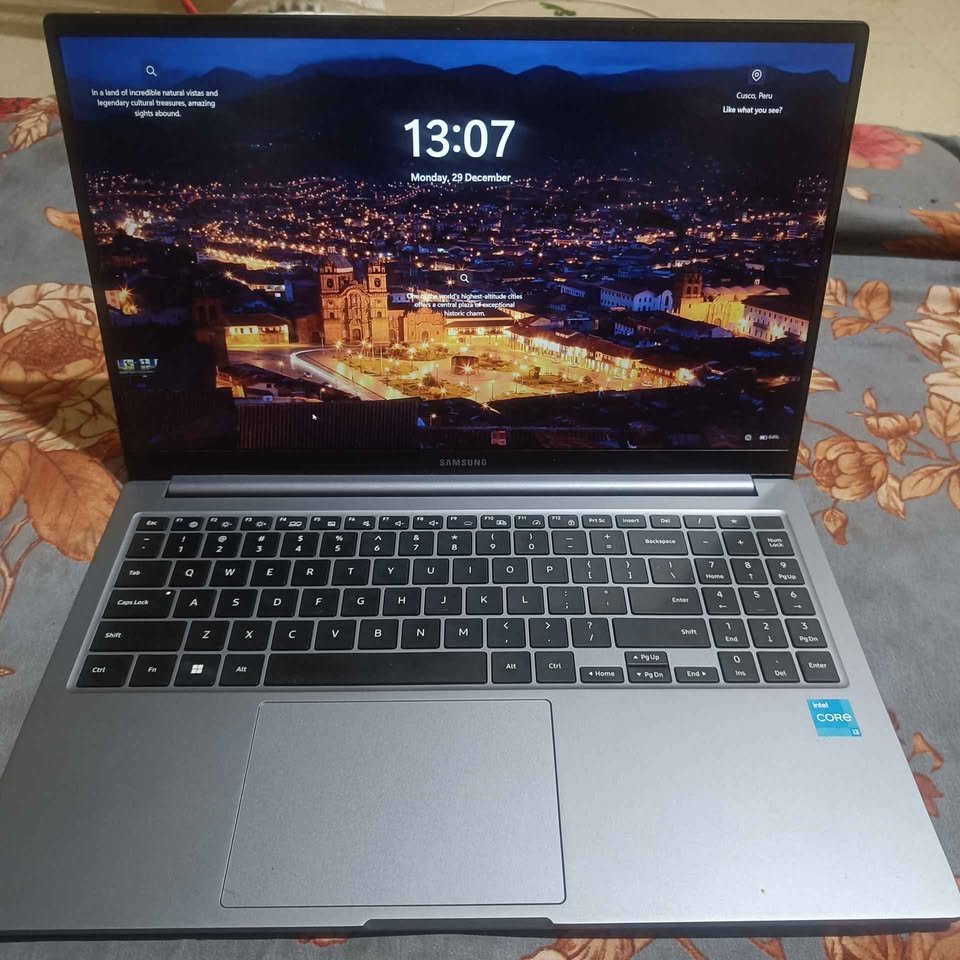 Samsung Galaxy Book4 (Intel Core i5‑1335U) laptop open, showing keyboard, trackpad and display