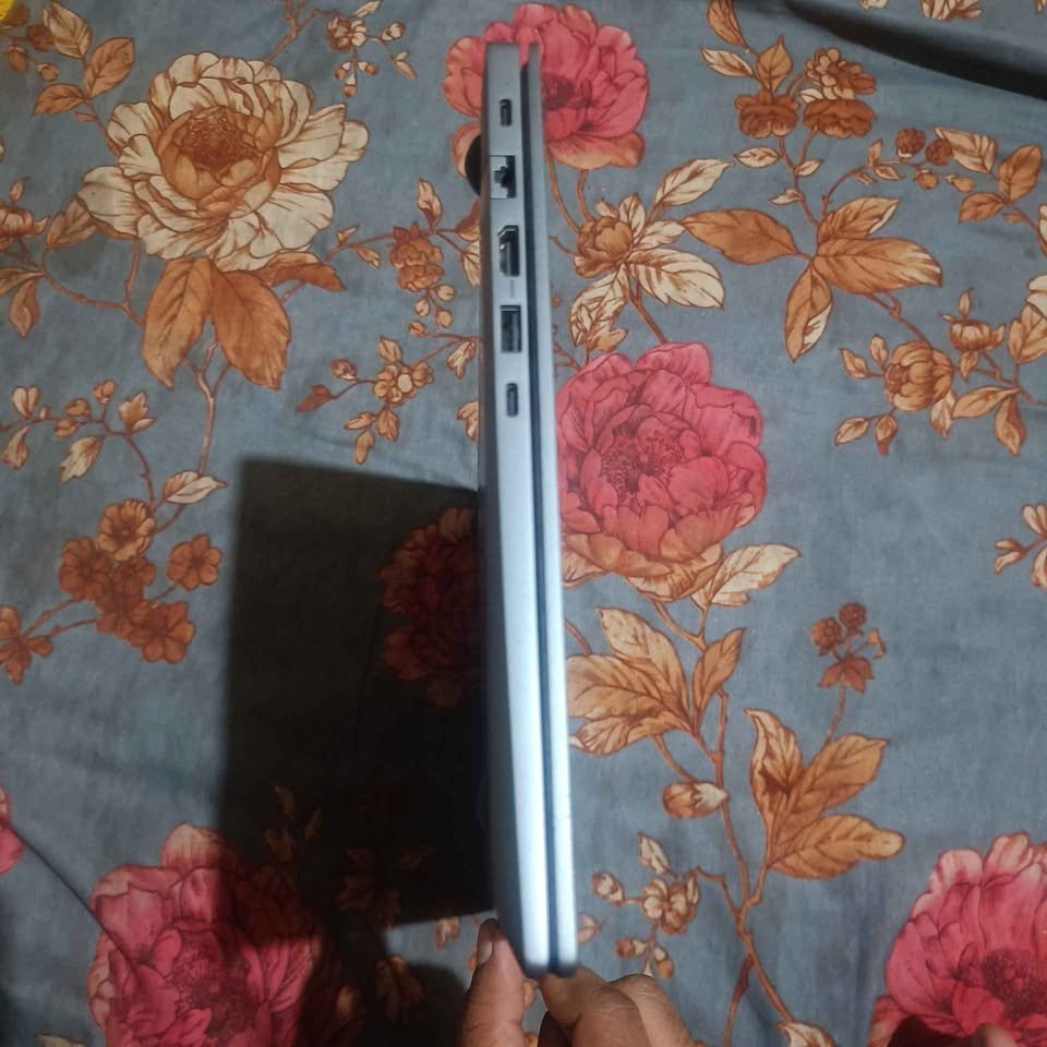Samsung Galaxy Book4 Core i5‑1335U laptop side profile highlighting built‑in connectivity ports (LAN, HDMI, USB)