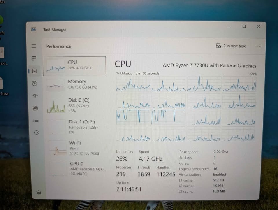 Windows Task Manager Performance tab showing AMD Ryzen 7 7730U CPU usage (26%) and speed (4.17 GHz) graphs