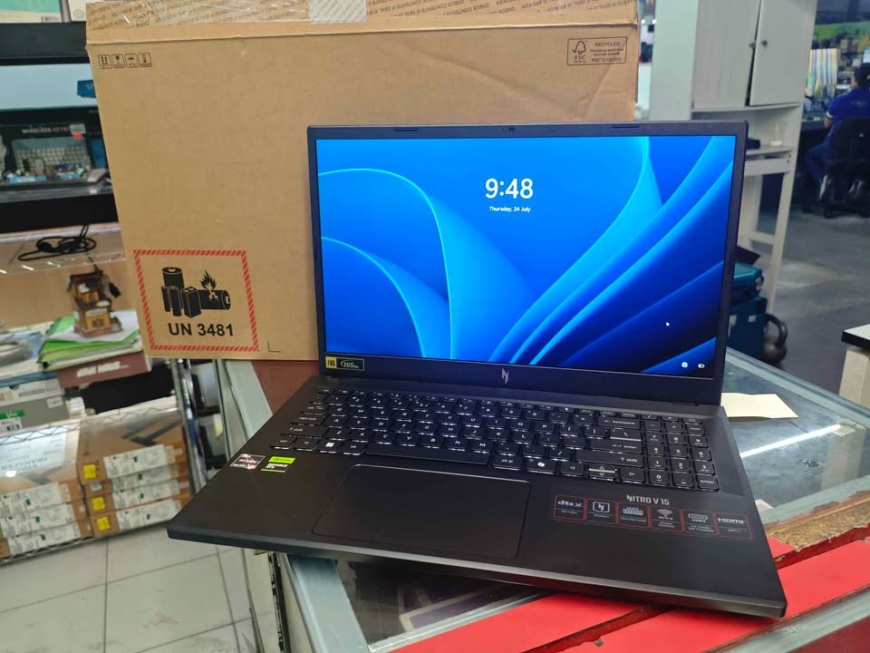 Acer Nitro V 15 gaming laptop with AMD Ryzen 5 processor featuring a crisp vivid blue 15.6-inch Full HD display running Windows 11