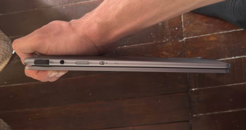 Lenovo Yoga Slim 7 laptop right side view showing 3.5mm headphone jack, power button, and volume controls